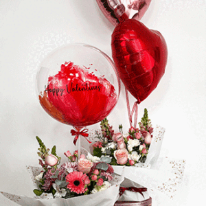 mix of flowers with a valentines day ballon